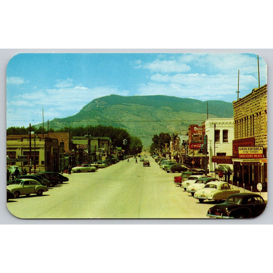 Postcard WY Cody Main Street And Business District Coca-Cola Old Cars UNP B7